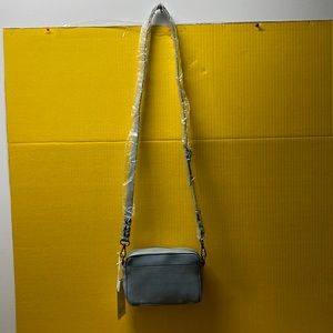 Time and Tru light blue crossbody zippered purse. New with tags Measures 7.5x5.5